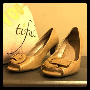 Open toe heels with buckle design